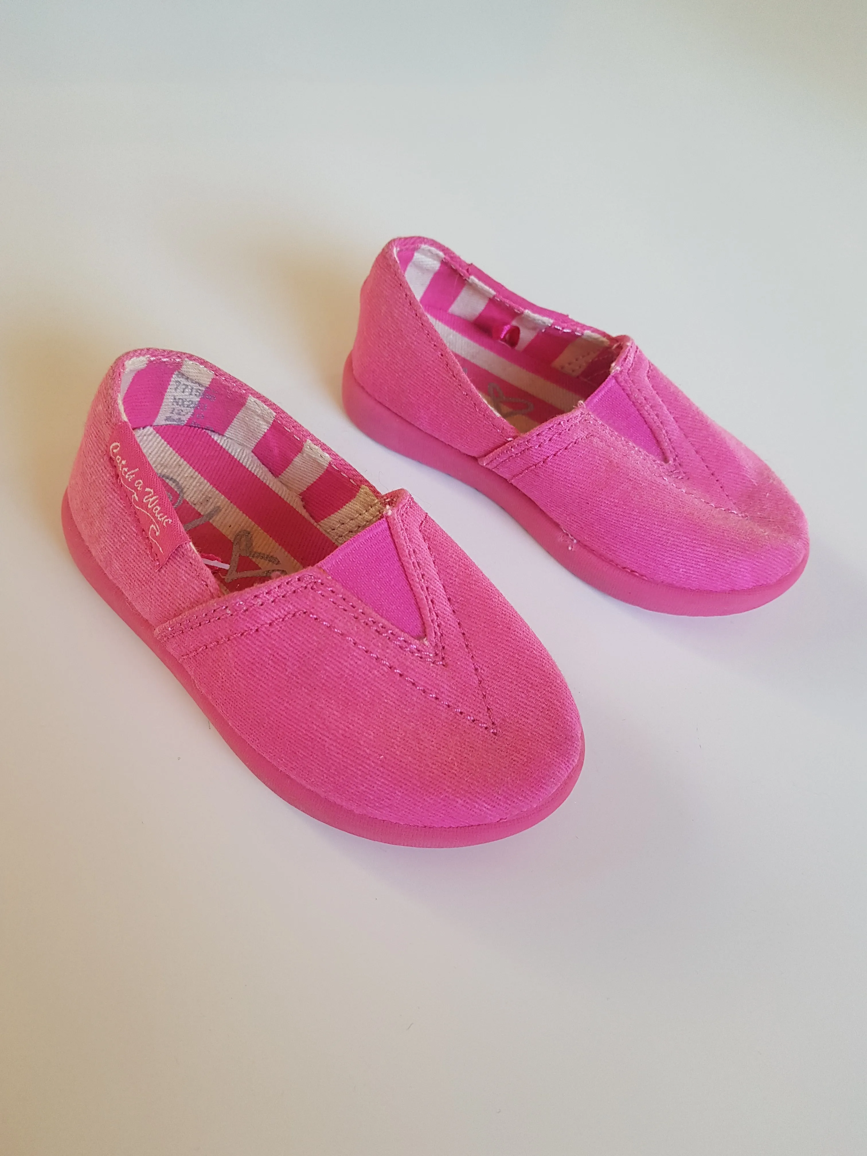 Pink slip on shoes